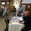 Matthew Quick signs more books for students